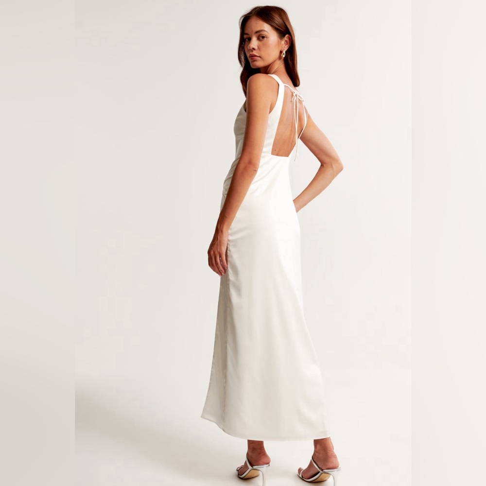New with tags never worn white draped skirt, maxi dress.
